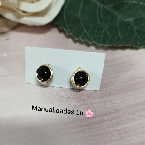 Aretes con perla envuelta. p83N — imagen 1