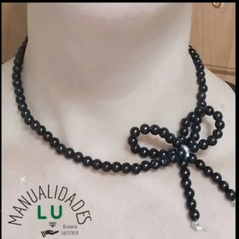 Collar de perlas con lazo coquette. p59N — imagen 2