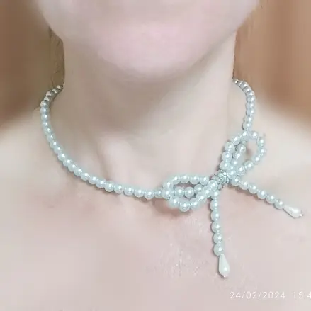 Collar de perlas con lazo coquette. p59N — imagen 1