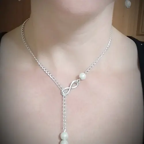 Cadena con infinito y perlas. — imagen 1