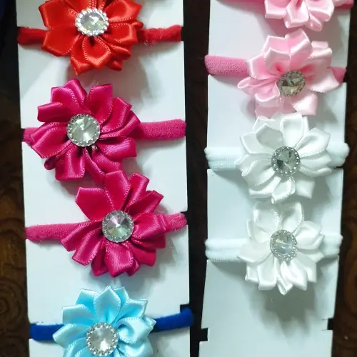Par de felpas con flor de satín. — imagen 1