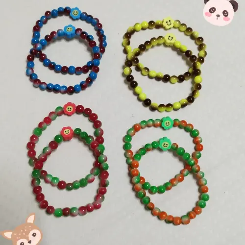 Pulso con cuentas de cristal bicolor. — imagen 2