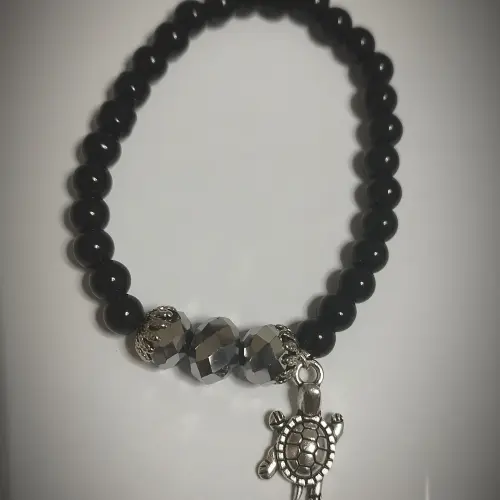 Pulso de perlas negras con dije plateado. p27 y p29N — imagen 2