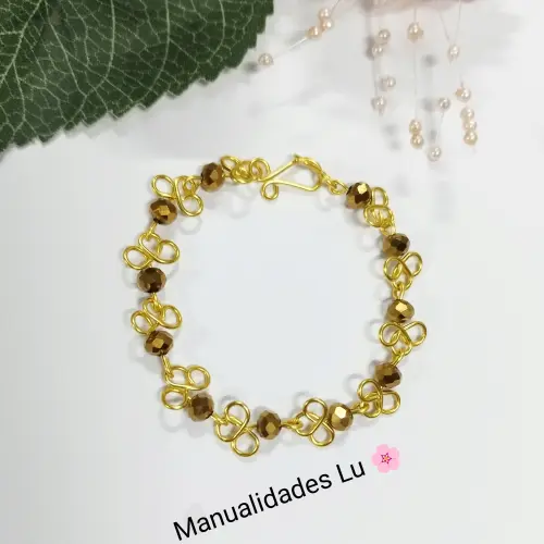 Manilla de trébol con piedras semipreciosas.'s photo #1