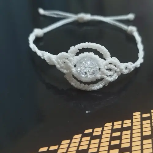 Pulsera macramé tejida en forma de reloj. p31N — imagen 1