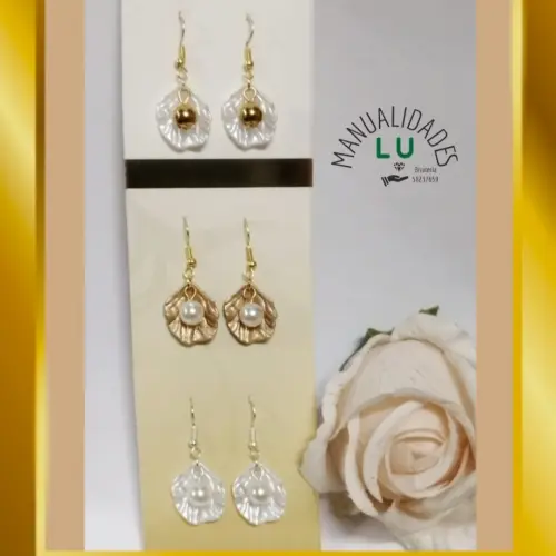Par de aretes con ostras. #82A — imagen 1