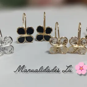 Par de aretes mariposa rellena. #81A — imagen 1