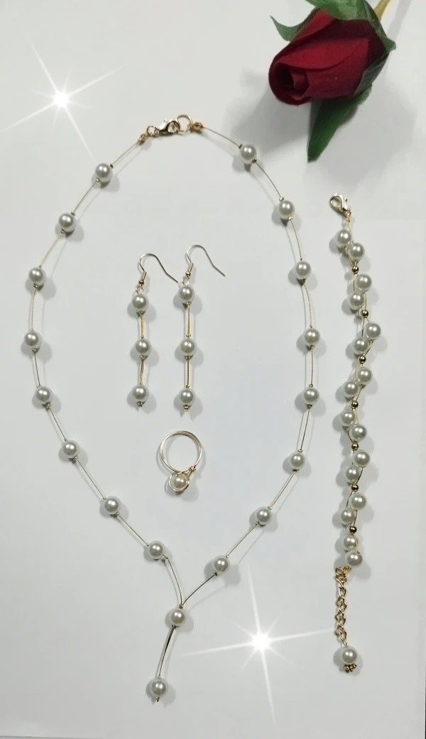 Juego de collar, aretes, pulsera y anillo de perlas's foto | Manualidades Lu 🌸 |  BizneCubano