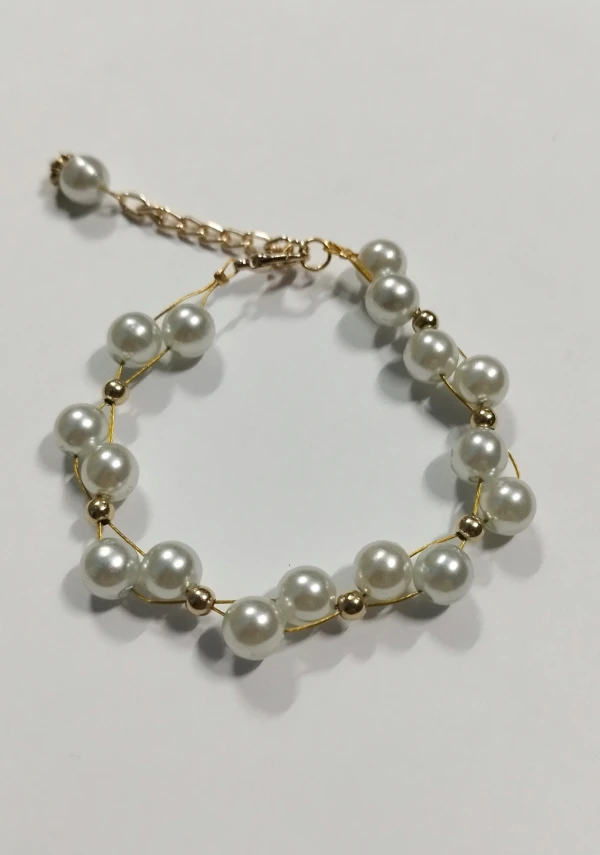 Pulso de perlas y alambre acerado. p52N's foto | Manualidades Lu 🌸 |  BizneCubano