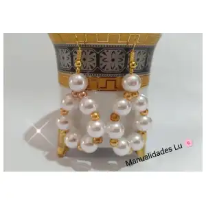 Aretes con perlas en círculo. miniatura 2