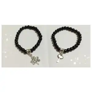 Pulso de perlas negras con dije plateado. p27 y p29N miniatura 1