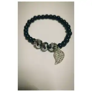 Pulso de perlas negras con dije plateado. p27 y p29N miniatura 3
