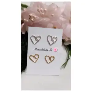 Par de aretes postes en forma de corazón. #33N miniatura 1